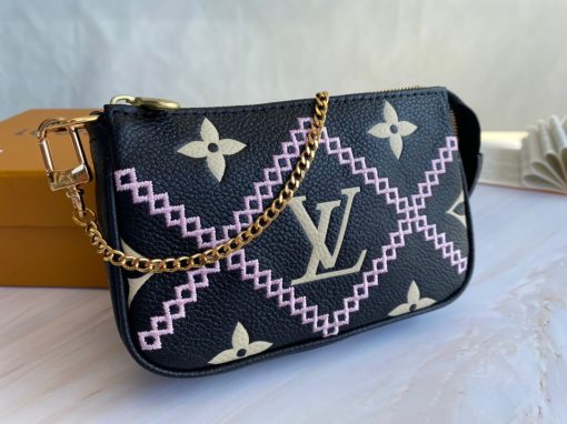 LOUIS VUITTON Mini Pochette Accessoires- Monogram Empreinte Broderies.