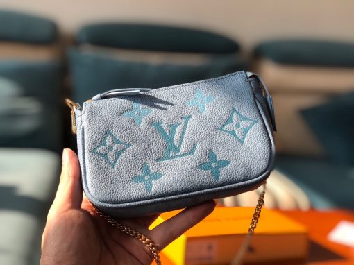 LOUIS VUITTON Mini Pochette Accessoires- Monogram Empreinte Broderies.