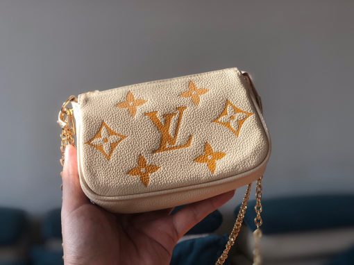 LOUIS VUITTON Mini Pochette Accessoires- Monogram Empreinte Broderies.