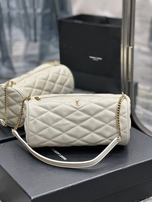 SAINT LAURENT Sade Tube Bag. Original Quality Bag including gift box, care book, dust bag, authenticity card. Saint Laurent "Sade" shoulder bag in quilted lambskin leather. Features YSL logo lettering on front Chain/leather shoulder strap, zip top closure Interior, one slip pocket.