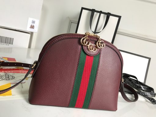 GUCCI Ophidia GG Small Rounded Top Shoulder Bag. Original Quality Bag including gift box, care book, dust bag, authenticity card. This rounded top shoulder bag is a heritage-inspired addition to accessories edit. Complete with the label's signature motifs – GG Supreme print, green and red Web, and golden-tone hardware – it's a perfect modern interpretation of coveted vintage pieces. Carry the runway design with tailored looks for effortless workwear style.