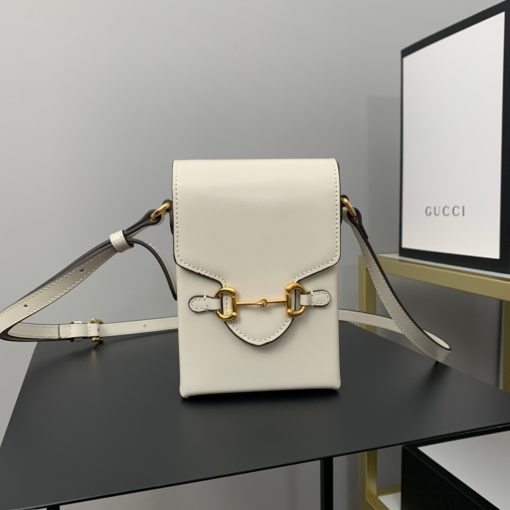 GUCCI Horsebit 1955 Mini Bag. Original Quality Bag including gift box, care book, dust bag, authenticity card. Presented in a petite rectangular shape, this mini bag is introduced for Pre-Fall 2020 in brown leather. Inspired by archival designs, the accessory highlights the double ring and bar design that has been established as one of the most distinctive elements among the House symbols borrowed from the equestrian world. Pieces with versatile ways to wear and style embrace each person who is part of the House’s individual spirit.