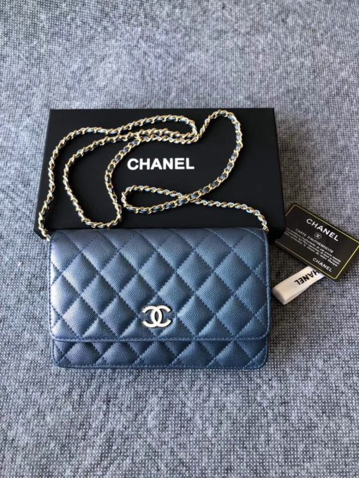 CHANEL Classic Wallet on Chain. Authentic Quality Wallet, including gift box, literature, dust bag, authenticity card. Classic and elegant, a Chanel bag is a fashion statement to your outfit, as seen in this caviar leather flap wallet on chain. Featuring a diamond quilted finish, metal-tone hardware, a foldover top, an internal zipped pocket, an internal slip pocket, an internal logo stamp, a back slip pocket, tortoiseshell details, and a CC turn-lock fastening.