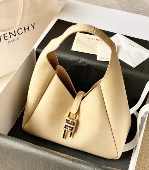 GIVENCHY Medium G-Hobo Bag. Original Quality Wallet including gift box, care book, dust bag, authenticity card. The G-Hobo Medium shoulder bag from Givenchy has a slouched, triangular silhouette. The calf leather design is a house signature style that's further embellished with the iconic 4G padlock and croc-effect straps.