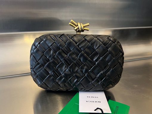 BOTTEGA VENETA Knot Clutch. Original Quality Bag including gift box, care book, dust bag, authenticity card. Bottega Veneta's intrecciato technique has rapidly become a signature style code of the Italian brand since its founding in 1966, amassing fans from across the globe. This leather clutch features a contemporary update in the form of a knot. Wear yours with vibrant outfits.