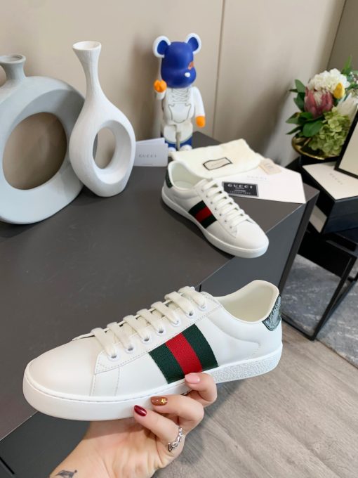 GUCCI Sneaker. Original Quality Sneaker including gift box, care book, dust bag, authenticity card. The classic low-top sneaker in leather with Web detail. These are so great that they would soon become a part of your every day wardrobe.