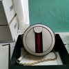 GUCCI GG Marmont Mini Leather Round Shoulder Bag. This Gucci GG Marmont mini round shoulder bag certainly seems to fit the bill! Mini bags are hot this season and we could be more supportive of this trend. This bag from Gucci is only for essentials, the phone will be on your hands, the credit card in your pocket and your lipstick have a 24-hour duration. Crafted from plain/quilted leather, this fun-size accessory has a chain and leather shoulder strap and is adorned with the signature metal GG logo. All the best things come in small packages. Featuring a top zip fastening and gold-tone/silver-tone hardware.