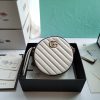 GUCCI GG Marmont Mini Leather Round Shoulder Bag. This Gucci GG Marmont mini round shoulder bag certainly seems to fit the bill! Mini bags are hot this season and we could be more supportive of this trend. This bag from Gucci is only for essentials, the phone will be on your hands, the credit card in your pocket and your lipstick have a 24-hour duration. Crafted from plain/quilted leather, this fun-size accessory has a chain and leather shoulder strap and is adorned with the signature metal GG logo. All the best things come in small packages. Featuring a top zip fastening and gold-tone/silver-tone hardware.