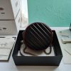 GUCCI GG Marmont Mini Leather Round Shoulder Bag. This Gucci GG Marmont mini round shoulder bag certainly seems to fit the bill! Mini bags are hot this season and we could be more supportive of this trend. This bag from Gucci is only for essentials, the phone will be on your hands, the credit card in your pocket and your lipstick have a 24-hour duration. Crafted from plain/quilted leather, this fun-size accessory has a chain and leather shoulder strap and is adorned with the signature metal GG logo. All the best things come in small packages. Featuring a top zip fastening and gold-tone/silver-tone hardware.