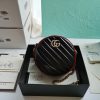 GUCCI GG Marmont Mini Leather Round Shoulder Bag. This Gucci GG Marmont mini round shoulder bag certainly seems to fit the bill! Mini bags are hot this season and we could be more supportive of this trend. This bag from Gucci is only for essentials, the phone will be on your hands, the credit card in your pocket and your lipstick have a 24-hour duration. Crafted from plain/quilted leather, this fun-size accessory has a chain and leather shoulder strap and is adorned with the signature metal GG logo. All the best things come in small packages. Featuring a top zip fastening and gold-tone/silver-tone hardware.