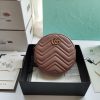 GUCCI GG Marmont Mini Leather Round Shoulder Bag. This Gucci GG Marmont mini round shoulder bag certainly seems to fit the bill! Mini bags are hot this season and we could be more supportive of this trend. This bag from Gucci is only for essentials, the phone will be on your hands, the credit card in your pocket and your lipstick have a 24-hour duration. Crafted from plain/quilted leather, this fun-size accessory has a chain and leather shoulder strap and is adorned with the signature metal GG logo. All the best things come in small packages. Featuring a top zip fastening and gold-tone/silver-tone hardware.