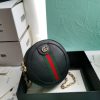 GUCCI GG Marmont Mini Leather Round Shoulder Bag. This Gucci GG Marmont mini round shoulder bag certainly seems to fit the bill! Mini bags are hot this season and we could be more supportive of this trend. This bag from Gucci is only for essentials, the phone will be on your hands, the credit card in your pocket and your lipstick have a 24-hour duration. Crafted from plain/quilted leather, this fun-size accessory has a chain and leather shoulder strap and is adorned with the signature metal GG logo. All the best things come in small packages. Featuring a top zip fastening and gold-tone/silver-tone hardware.