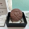 GUCCI GG Marmont Mini Leather Round Shoulder Bag. This Gucci GG Marmont mini round shoulder bag certainly seems to fit the bill! Mini bags are hot this season and we could be more supportive of this trend. This bag from Gucci is only for essentials, the phone will be on your hands, the credit card in your pocket and your lipstick have a 24-hour duration. Crafted from plain/quilted leather, this fun-size accessory has a chain and leather shoulder strap and is adorned with the signature metal GG logo. All the best things come in small packages. Featuring a top zip fastening and gold-tone/silver-tone hardware.