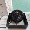 GUCCI GG Marmont Mini Leather Round Shoulder Bag. This Gucci GG Marmont mini round shoulder bag certainly seems to fit the bill! Mini bags are hot this season and we could be more supportive of this trend. This bag from Gucci is only for essentials, the phone will be on your hands, the credit card in your pocket and your lipstick have a 24-hour duration. Crafted from plain/quilted leather, this fun-size accessory has a chain and leather shoulder strap and is adorned with the signature metal GG logo. All the best things come in small packages. Featuring a top zip fastening and gold-tone/silver-tone hardware.
