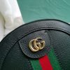 GUCCI GG Marmont Mini Leather Round Shoulder Bag. This Gucci GG Marmont mini round shoulder bag certainly seems to fit the bill! Mini bags are hot this season and we could be more supportive of this trend. This bag from Gucci is only for essentials, the phone will be on your hands, the credit card in your pocket and your lipstick have a 24-hour duration. Crafted from plain/quilted leather, this fun-size accessory has a chain and leather shoulder strap and is adorned with the signature metal GG logo. All the best things come in small packages. Featuring a top zip fastening and gold-tone/silver-tone hardware.