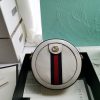 GUCCI GG Marmont Mini Leather Round Shoulder Bag. This Gucci GG Marmont mini round shoulder bag certainly seems to fit the bill! Mini bags are hot this season and we could be more supportive of this trend. This bag from Gucci is only for essentials, the phone will be on your hands, the credit card in your pocket and your lipstick have a 24-hour duration. Crafted from plain/quilted leather, this fun-size accessory has a chain and leather shoulder strap and is adorned with the signature metal GG logo. All the best things come in small packages. Featuring a top zip fastening and gold-tone/silver-tone hardware.