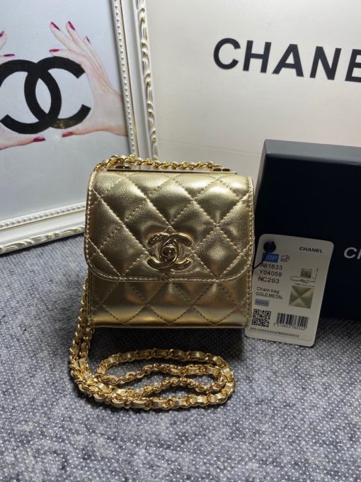 CHANEL Mini CC Clutch with Chain. Authentic Quality Clutch with literature, dust bag, box, CHANEL fabric flower, and authenticity card. This trendy CHANEL CC Clutch with Chain is crafted from quilted lambskin leather, features woven-in leather chain strap, logo metal plate, and aged gold-tone hardware. Its turn-lock closure opens to a black fabric interior with slip pockets.