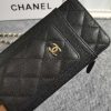 CHANEL Compact Double Pouch With Chain. This bag is designed with a Classic Look refined the gold toned iconic CC logo and the woven chain leather strap for shoulder carry. It’s made from soft and luxurious lambskin. The bag features a front pocket for card slots and several patch pockets including a center zip pocket. It’s a simple yet easy-to-transport bag for casual use, like a WOC but then smaller. Actually, it’s better than the Flat Wallet Pouch. More convenient thanks to the extra pockets..