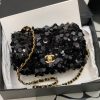 CHANEL Mini Flap Bag In Sequins.  Original Quality Bag including gift box, care book, dust bag, authenticity card. This small sleek flap bag is beautifully crafted of the layering of small and large sequins that create the entire surface of the bag. The elegant handbag features polished chain link leather threaded shoulder straps and a Chanel CC turn lock. This opens to a leather interior with room for your necessities for day or evening with the timeless style.
