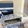 CHANEL Mini Flap Bag In Sequins.  Original Quality Bag including gift box, care book, dust bag, authenticity card. This small sleek flap bag is beautifully crafted of the layering of small and large sequins that create the entire surface of the bag. The elegant handbag features polished chain link leather threaded shoulder straps and a Chanel CC turn lock. This opens to a leather interior with room for your necessities for day or evening with the timeless style.