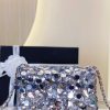 CHANEL Mini Flap Bag In Sequins.  Original Quality Bag including gift box, care book, dust bag, authenticity card. This small sleek flap bag is beautifully crafted of the layering of small and large sequins that create the entire surface of the bag. The elegant handbag features polished chain link leather threaded shoulder straps and a Chanel CC turn lock. This opens to a leather interior with room for your necessities for day or evening with the timeless style.