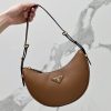 PRADA Leather Shoulder Bag.  High-End Quality Bag including gift box, care book, dust bag, authenticity card. This sleek leather bag expresses versatile, modernist allure. The accessory with a curvy silhouette is completed by the leather extension for versatile wear. With a nappa leather lining and metal hardware, the bag is accented with the iconic enameled metal triangle logo on the front.