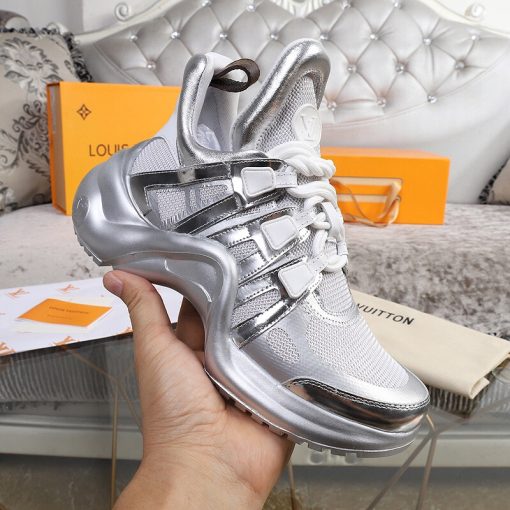 LOUIS VUITTON 'Archlight' Trainer. Original Quality Sneaker including gift box, care book, dust bag, authenticity card. This futuristic sneaker balances a springy wave-shaped outsole and an oversized tongue with a low cut around the ankle for a delicate, feminine touch.