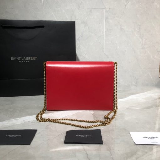 SAINT LAURENT Cassandra Monogram Chain Bag. Original Quality Bag including gift box, literature, dust bag, authenticity card. This Cassandra shoulder bag is a masterclass in refined elegance. Crafted in calf leather, it's punctuated with metal-tone hardware including purse feet to keep it in pristine condition. Whether you wear it over one shoulder or carried in-hand is up to you.