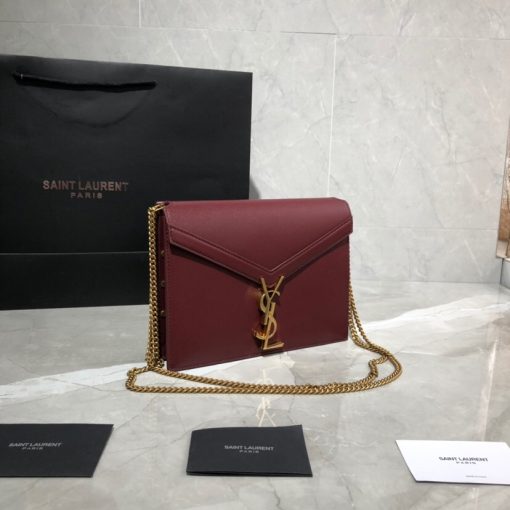 SAINT LAURENT Cassandra Monogram Chain Bag. Original Quality Bag including gift box, literature, dust bag, authenticity card. This Cassandra shoulder bag is a masterclass in refined elegance. Crafted in calf leather, it's punctuated with metal-tone hardware including purse feet to keep it in pristine condition. Whether you wear it over one shoulder or carried in-hand is up to you.