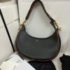 CELINE Medium Ava Strap Bag. High-End Quality Bag including gift box, care book, dust bag, authenticity card. Celine's Ava bag is a perfect example of the brand's signature style, with powerful understated elegance. Crafted from a variety of materials, including iconic leather and textiles with the stylish Celine logo plastering the surface, the bag is a classic with a hint of '80s-inspired blouson. Taking inspiration from the iconic Arc de Triomphe, the logo features two opposites-facing Cs and a patterned center. The minimalist aesthetic of the new logo and colors perfectly encapsulates the essence of the brand. The semi-moon silhouette and adjustable shoulder straps allows the bag to be styled any number of ways, making it perfect for someone who carries minimal items on a daily basis without needing a crossbody strap. With enough room for the essentials, the Celine Ava bag is an ultimate cool-girl essential.