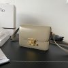 CELINE Teen Triomphe. High-End Quality Bag including gift box, care book, dust bag, authenticity card. In 2018, Hedi Slimane released the original Triomphe to much acclaim. Since then, the stylish purse has been spotted on the arms of celebrities and fashion insiders across the world. With its smooth leather exteriors and minimalistic hardware, the crossbody design reconciles fashion and function, featuring Celine's signature golden Triomphe logo fastener. It has attracted the attention of bag collectors and fashion historians alike for its sophisticated yet simple design. This classic piece has inspired a series of spinoffs, proving its timelessness and forever cementing the Triomphe as a fashion icon.
