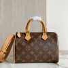 LOUIS VUITTON Speedy Bandoulière 20. Experience elegance and sophistication with this timeless designer handbag. This is an iconic and stylish designer handbag, perfect for any fashionable woman. The Speedy Bandoulière 20 has all the features that make Louis Vuitton such a sought-after luxury brand. This bag has a resilient material, deep pockets, a spacious interior, and an adjustable shoulder strap. The exterior is crafted from durable and elegant Monogram canvas, giving it a timeless style that will last for years. It also features a discreet Lozine trim, making it both striking and sophisticated. Inside, it is lined with matching textiles with a pocket for small items, ensuring all your essentials are secure and organized. The adjustable strap allows you to wear the bag on the shoulder or carry it as a top handle bag, making it perfect for either day or night. And with a zip closure, you can always rest assured that all your items are safely contained. The Speedy Bandoulière 20 is sure to add a touch of luxury to any look.