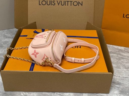 LOUIS VUITTON Mini Bumbag. High-End Quality Bag including gift box, care book, dust bag, authenticity card. Part of Louis Vuitton's Gradient Collection, the Mini Bumbag is an elegant take on the on-trend bag format. Crafted from Monogram Empreinte leather with a stunning printed gradation of colors, this bag will make a stylish addition to your accessory wardrobe. It features a zipped main compartment with a front pocket adorned with a Louis Vuitton leather tag as well as adjustable, removable straps that you can use for either cross-body or shoulder wear. This Mini Bumbag also comes with a stylish, gold-tone chain making it the perfect accessory for any summer occasion.