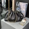 LOEWE Medium Flamenco Purse: Elegant Sophistication. Meet the Flamenco Purse – where timeless style meets modern elegance. Defined by its beautifully ruched design and signature side knots, this medium-sized bag is crafted from soft, supple nappa lambskin. It's the perfect blend of luxurious texture and sophisticated detailing, making it an essential accessory for any wardrobe.