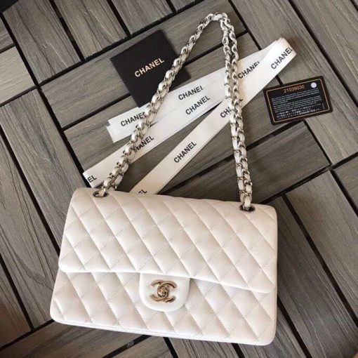 CHANEL Medium Classic Flap Bag. Original Quality Bag. CHANEL Sales Box and Dust Bag. Booklet, Authenticity Card, Payment Slip. Whether you’re a young celeb looking to carry a flashy mini bag in front of the paparazzi or a corporate maven looking for a roomy day bag that announces that you’ve arrived. Many sizes, colors and variations on the Classic Flap mean that there’s likely a version that will suit your purposes. The bags tend to hold their value well for years.