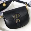 DIOR Small Bobby Bag. Original Quality Bag, including gift box, literature, dust bag, authenticity card. Maria Grazia Chiuri introduced a new silhouette to the French fashion house’s repertoire of It bags: the Dior Bobby which pays homage to the lovely pooch of the master himself. The Dior Bobby is a rounded flap that is similar to the D-fence bag with the classic CD logo. Got to admit, Bobby offers the best size for a bag that’s meant to be functional, easy to strut around in while looking like a million bucks. The Dior Bobby is a sassy shoulder bag that’s well suited for today’s call for practicality. Its feminine curve and the ‘30 Montaigne’ address on the back, renders a subtle echo of the eponymous symbolic bag.