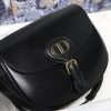 DIOR Small Bobby Bag. Original Quality Bag, including gift box, literature, dust bag, authenticity card. Maria Grazia Chiuri introduced a new silhouette to the French fashion house’s repertoire of It bags: the Dior Bobby which pays homage to the lovely pooch of the master himself. The Dior Bobby is a rounded flap that is similar to the D-fence bag with the classic CD logo. Got to admit, Bobby offers the best size for a bag that’s meant to be functional, easy to strut around in while looking like a million bucks. The Dior Bobby is a sassy shoulder bag that’s well suited for today’s call for practicality. Its feminine curve and the ‘30 Montaigne’ address on the back, renders a subtle echo of the eponymous symbolic bag.