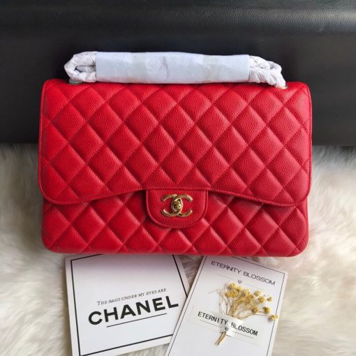 CHANEL 2.55 Classic Diamond Quilted Leather Double Flap Bag. Original Quality Bag. Authentic calfskin. Metal Toned Hardware. CHANEL Sales Box and Dust Bag. Booklet, Authenticity Card. The name 2.55 refers to the release of the bag in February 1955. It had a rectangular turn-lock which was called the Mademoiselle Lock. The 'CC' lock was introduced to the Classic Flap Bags only in the 1980s by designer Karl Lagerfeld. The all chain strap was replaced with the iconic leather interwoven chain link strap.