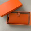 HERMÈS Béarn Wallet: Where Elegance Meets Functionality, Inspired by the Heart of France's South-West. The Béarn pays homage to the enchanting South-West region of France and stands as a distinguished member of a collection that honors various distinctive French regions. This wallet or card holder boasts an elegantly sleek design and is thoughtfully equipped with multiple compartments tailored for organizing credit cards, coins, and bills with ease. Upon closure, a supple leather flap gracefully glides into an iconic "H" shaped clasp, elevating it to a timeless classic. It presents a generous array of leather types and colors, allowing one to harmonize effortlessly with the latest trends in style.
