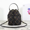 PRADA Quilted Bucket Bag. Original Quality Bag including gift box, care book, dust bag, authenticity card. PRADA nylon bucket bag with tessuto-impunturato quilted topstitching. Leather top handle. Drawstring top. Detachable Shoulder Strap. Front Zip Pocket with logo plate.