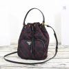 PRADA Quilted Bucket Bag. Original Quality Bag including gift box, care book, dust bag, authenticity card. PRADA nylon bucket bag with tessuto-impunturato quilted topstitching. Leather top handle. Drawstring top. Detachable Shoulder Strap. Front Zip Pocket with logo plate.