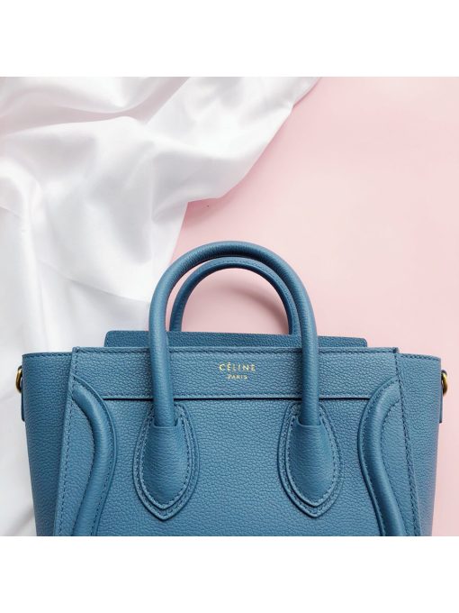 CELINE Luggage Nano. Original Quality Bag including gift box, care book, dust bag, authenticity card.  Nano luggage bag in calfskin with leather handles, a removable shoulder strap, and a zip closure. The bag has a zipped outer pocket on the front.