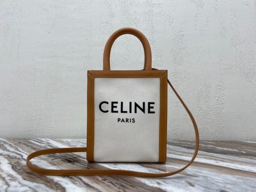 CELINE Cabas Triomphe Mini. Original Quality Bag including gift box, care book, dust bag, authenticity card. The Triomphe bag wasn’t really loved in the beginning, but its gaining traction and fame. The story started with the CELINE Triomphe bag, a magnificent bag that’s named after the Arc the Triomphe. A new chapter has started, CELINE has completed an entire collection of the Triomphe line. It includes a tote bag, bucket bag, camera bag, drawstring bag, and a Boston bag. All of these styles are made from Triomphe canvas and with calfskin trimming.