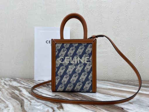 CELINE Cabas Triomphe Mini. Original Quality Bag including gift box, care book, dust bag, authenticity card. The Triomphe bag wasn’t really loved in the beginning, but its gaining traction and fame. The story started with the CELINE Triomphe bag, a magnificent bag that’s named after the Arc the Triomphe. A new chapter has started, CELINE has completed an entire collection of the Triomphe line. It includes a tote bag, bucket bag, camera bag, drawstring bag, and a Boston bag. All of these styles are made from Triomphe canvas and with calfskin trimming.