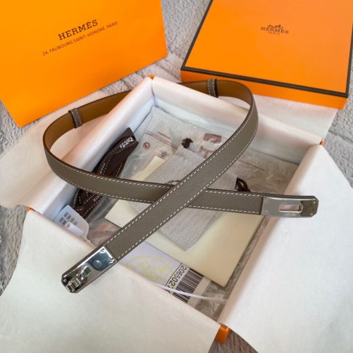 HERMÈS Kelly 18 Belt. Original Quality Belt including gift box, care book, dust bag, authenticity card. The variations of these one size fits all belts change the ways in which they can be worn by adjusting to all sizes while reinterpreting classic Hermes pieces with clever jewel clasps. Thanks to the clever sliding system, this one-size-fits-most belt may be worn at the waist or on the hips.