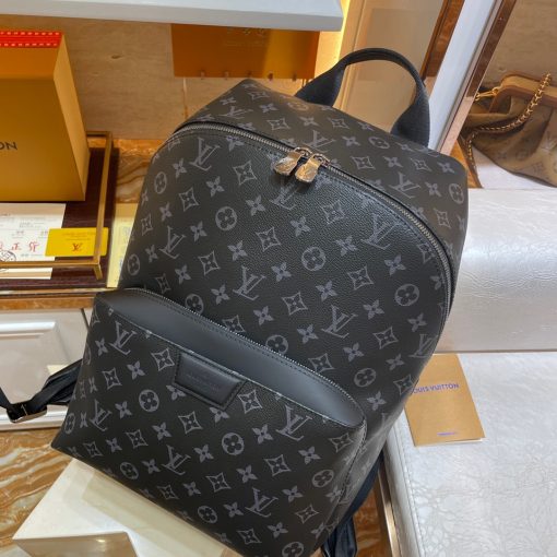 LOUIS VUITTON Discovery Backpack PM. Original Quality Backpack including gift box, care book, dust bag, authenticity card. Perfect for those who want a casual yet sophisticated bag, the Discovery Backpack in supple Monogram Eclipse coated canvas delivers both style and versatility. It boasts distinctive details like an ultra-comfortable leather strap and a front pocket with a magnetic closure.