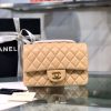 CHANEL Classic New Mini 20 cm Flap Bag. Original Quality Bag including gift box, care book, dust bag, authenticity card. This chic petite shoulder bag is crafted of luxurious shimmery lambskin leather. The crossbody bag features a long chain-link leather threaded shoulder strap and front flap with a CC turn lock. The flap opens to an interior of matching leather with zipper and patch pockets. Enjoy this fabulous bag for everyday essentials or special events with this timeless classic.