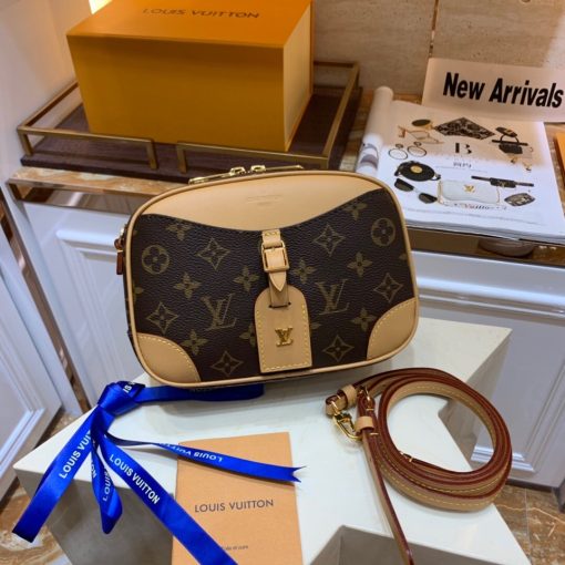 LOUIS VUITTON Deauville Mini Bag. Original Quality Bag including gift box, care book, dust bag, authenticity card. For Fall-Winter 2020, Nicolas Ghesquière introduces the Deauville Mini handbag. This adorable camera bag in Monogram canvas with natural leather trim will bring a touch of retro chic to any look. Compact and lightweight, it has an adjustable leather strap for shoulder and cross-body carry.