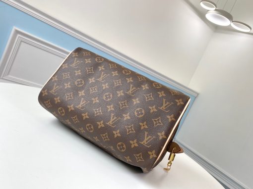 LOUIS VUITTON Speedy 30. Original Quality Bag including gift box, care book, dust bag, authenticity card. Made from iconic Monogram canvas, the LV Speedy 30 is an elegant, compact handbag, a stylish companion for city life. Launched in 1930 as the "Express" and inspired by that era's rapid transit, today’s updated Speedy remains a timeless House icon, with its unmistakable silhouette, rolled leather handles, and engraved, signature padlock.