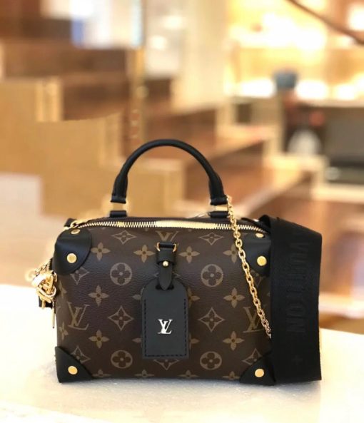 LOUIS VUITTON Petite Malle Souple. Original Quality Bag including gift box, care book, dust bag, authenticity card. The distinctive LV Petite Malle Souple is a soft handbag steeped in House history. The Monogram canvas, riveted leather corners, and leather name tag all evoke LOUIS VUITTON’s legacy as a trunk maker. A gold-color nautical chain and wide removable strap, with LOUIS VUITTON Malletier, embroidered on it, bring up-to-the-minute style.